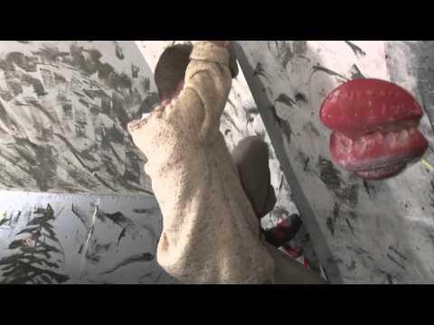 Student on climbing wall